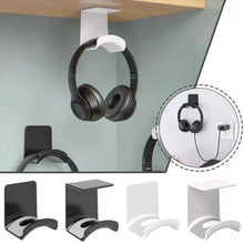 Headphone holder hanging under a desk with close-up details